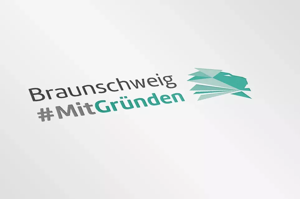 Auf einer weißen Fläche ist das Logo von #MitGründen zu sehen.