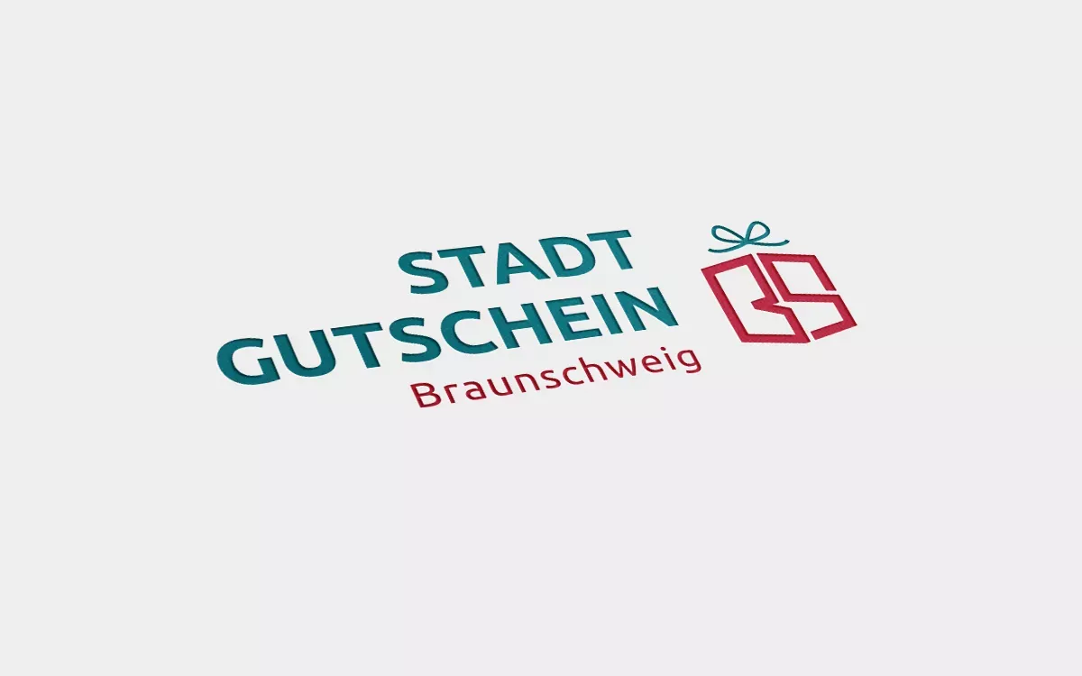 Das Logo des Stadtgutschein ist auf eine weiße Fläche gestellt.